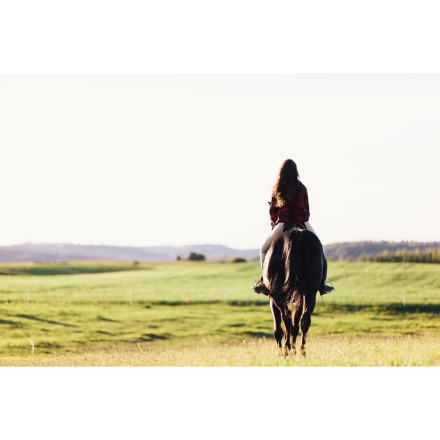 Girl Sitting on a Horse by Niserin - Wrapped Canvas Photograph Latitude Run Size: 30cm H x 46cm W on Productcaster.