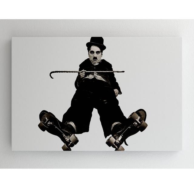 Charlie Chaplin Ice Rink - No Frame Print auf Leinwand ModernMoments Größe: 34,3 cm H x 48,5 cm B on Productcaster.