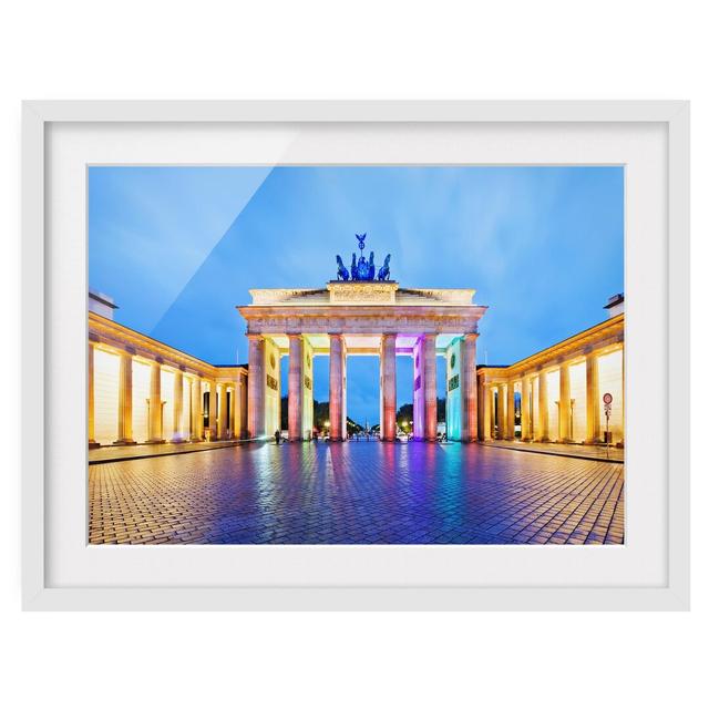 Illuminated Brandenburg Gate Framed Photographic Art Print East Urban Home Rahmenoptionen: Matt white, Size: 70cm H x 100cm W on Productcaster.