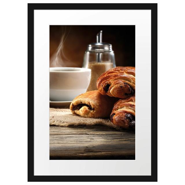 Gerahmtes Poster Croissant zum Kaffee East Urban Home Größe: 55 cm H x 40 cm B on Productcaster.