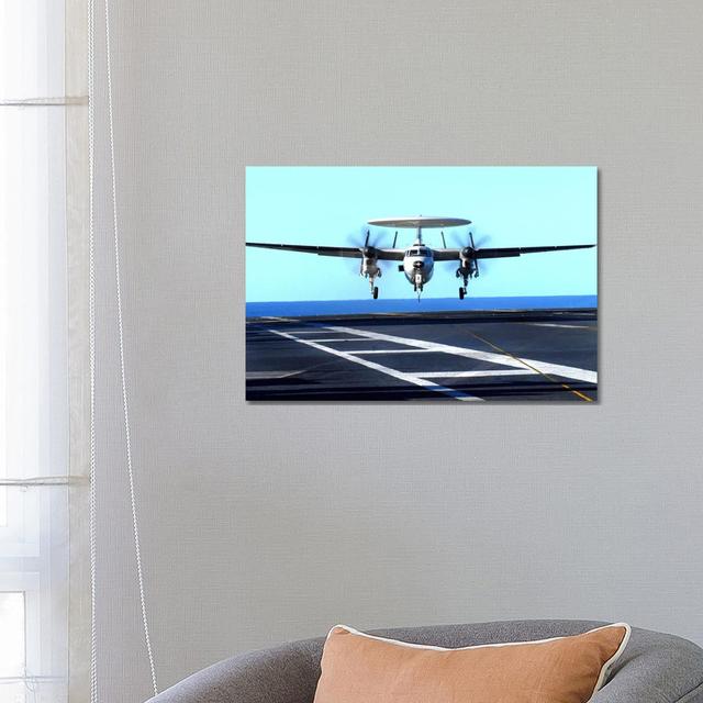 An E-2C Hawkeye Approaches for Landing Aboard USS John C. Stennis by Stocktrek Images - Wrapped Canvas Photograph Latitude Run Size: 45.72cm H x 66.04 on Productcaster.