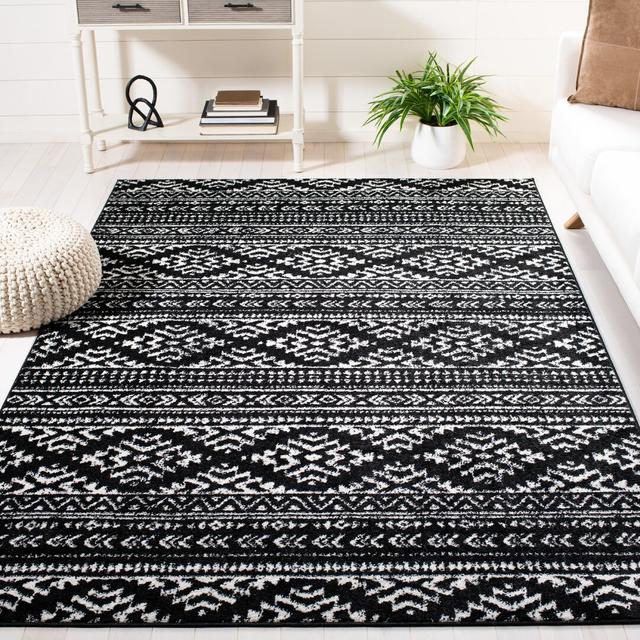 Peniste Power Loom Black/Ivory Rug Natur Pur Rug Size: Rectangle 200 x 300cm on Productcaster.