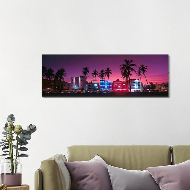 Bei Nacht beleuchtete HotelsSouth Beach Miami, Florida, USA Ebern Designs Größe: 40,64 cm H x 121,92 cm B x 1,9 cm T, Format: Leinwandbild on Productcaster.