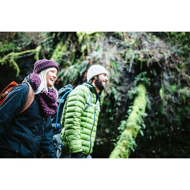 Couple Hiking In Forest by RyanJLane - No Frame Art Prints on Canvas 17 Stories Size: 81cm H x 122cm W on Productcaster.