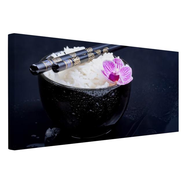 Rice Bowl with Orchid - Wrapped Canvas Graphic Art Ebern Designs Size: 50cm H x 100cm W, Format: 260g/m² canvas on Productcaster.