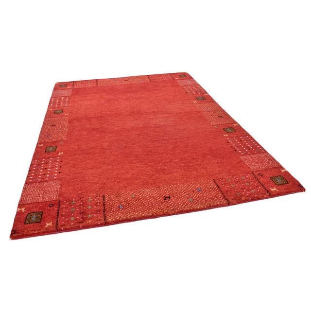 Handgeknüpfter Teppich Denver aus Schurwolle in Rot Theko Rug Size: Rectangular 170 x 240cm on Productcaster.