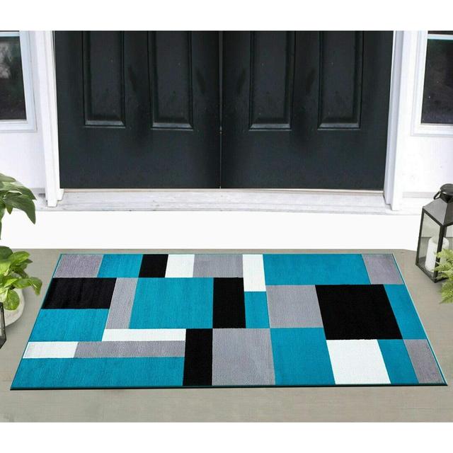 Tarra Tufted Teal/Black/White Area Rug Ebern Designs Rug Size: Rectangle 60 x 110cm on Productcaster.