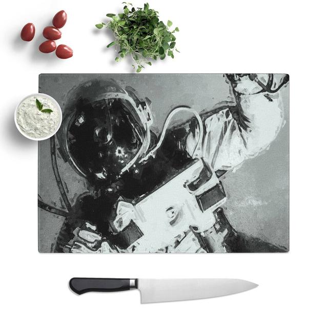 Tempered Glass an Astronaut in Zero Gravity Chopping Board East Urban Home Size: 39 cm W x 28.5 cm L on Productcaster.