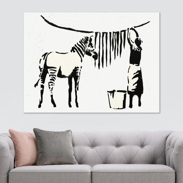 Zebra Washing - Wrapped Canvas Print ClassicLiving Size: 84cm H x 120cm W x 4cm D on Productcaster.