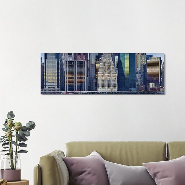 Skyscrapers In A City, New York City, New York State, USA 2011 by Panoramic Images - Wrapped Canvas Panoramic Print Ebern Designs Size: 40.64cm H x 12 on Productcaster.