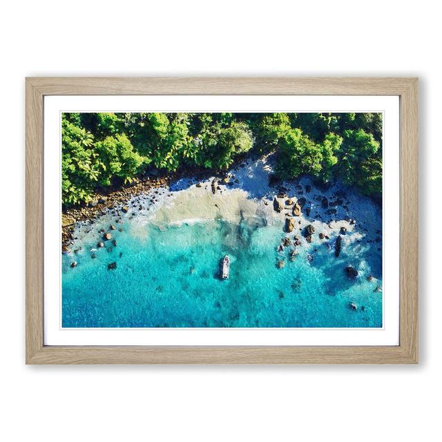 Boat by a Beach in the Seychelles - Picture Frame Painting Print on MDF East Urban Home Size: 36cm H x 48cm W x 2cm D, Frame Option: Oak Framed on Productcaster.