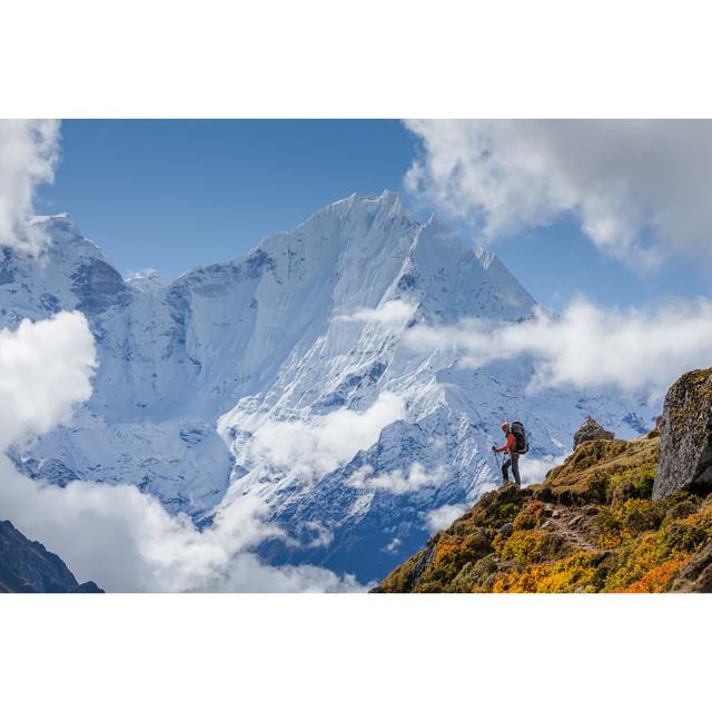 Hiker Walks On Train In Himalayas - Wrapped Canvas Print Union Rustic Size: 20cm H x 30cm W x 3.8cm D on Productcaster.