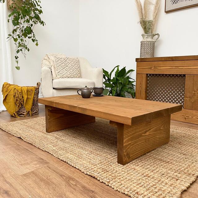 Norene Solid Wood Sled Coffee Table Alpen Home Colour: Dark Oak, Size: 30" H x 100" L x 60" W on Productcaster.