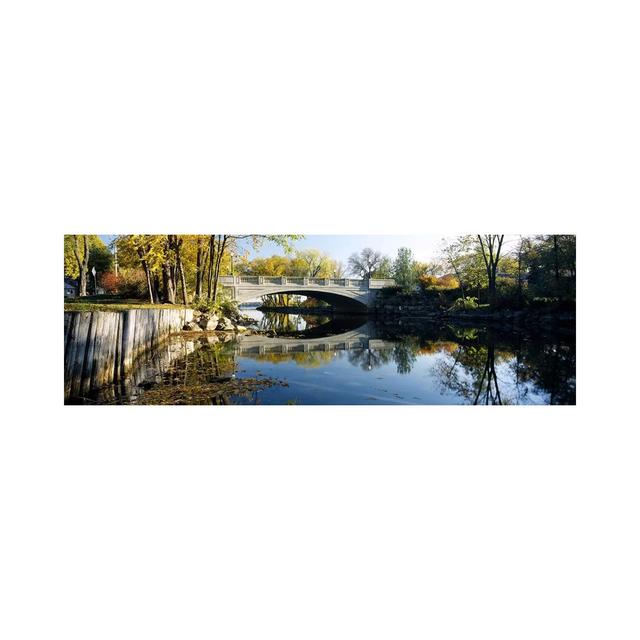 Bridge Across a River, Yahara River, Madison, Dane County, Wisconsin, USA - Wrapped Canvas Panoramic Photograph Union Rustic Size: 50.8cm H x 152.4cm on Productcaster.