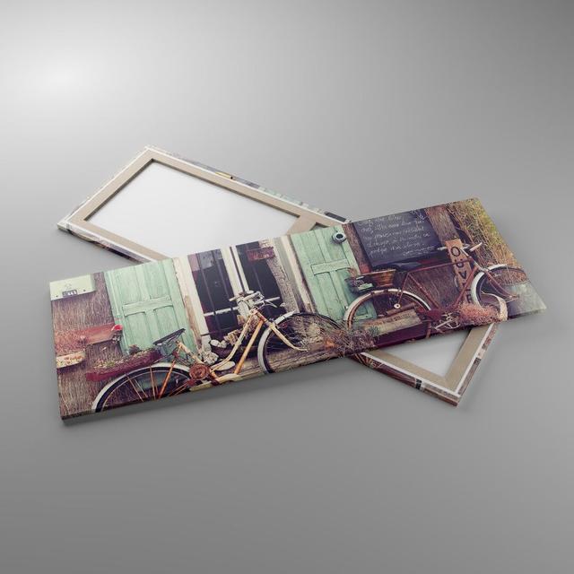 Bicycles Vintage Tenement - Wrapped Canvas Photograph Rosalind Wheeler Size: 50cm H x 140cm W x 1.8cm D on Productcaster.