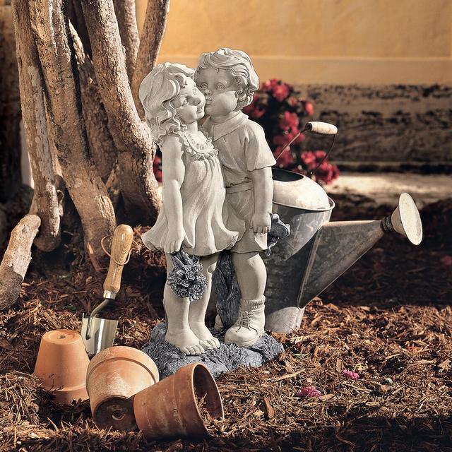 Young Sweethearts Kissing Children Garden Statue Design Toscano on Productcaster.