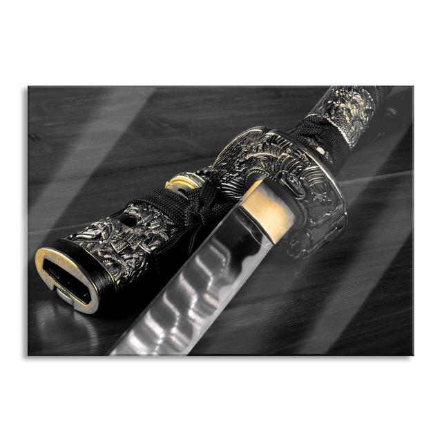 Gleaming Samurai Sword - No Frame Print on Glass Brayden Studio Size: 70cm H x 100cm W x 0.4cm D on Productcaster.