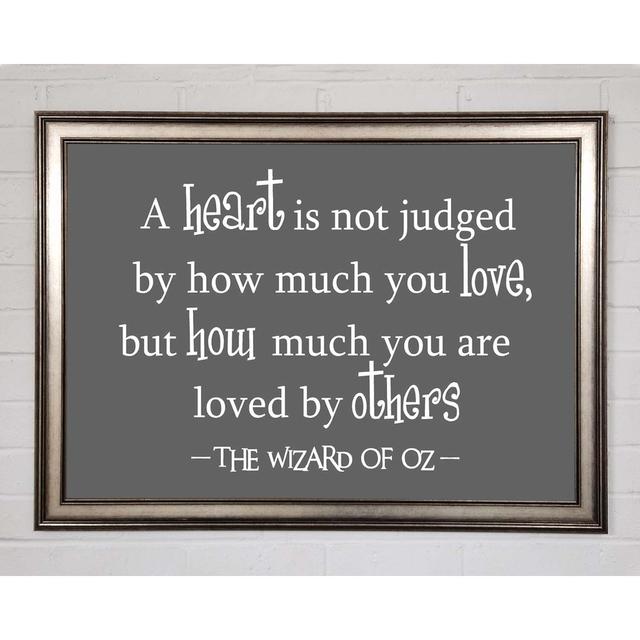 Movie Quote Wizard of Oz a Heart Is Not Judged Grey - Single Picture Frame Art Prints Happy Larry Size: 59.7cm H x 84.1cm W x 1.5cm D on Productcaster.