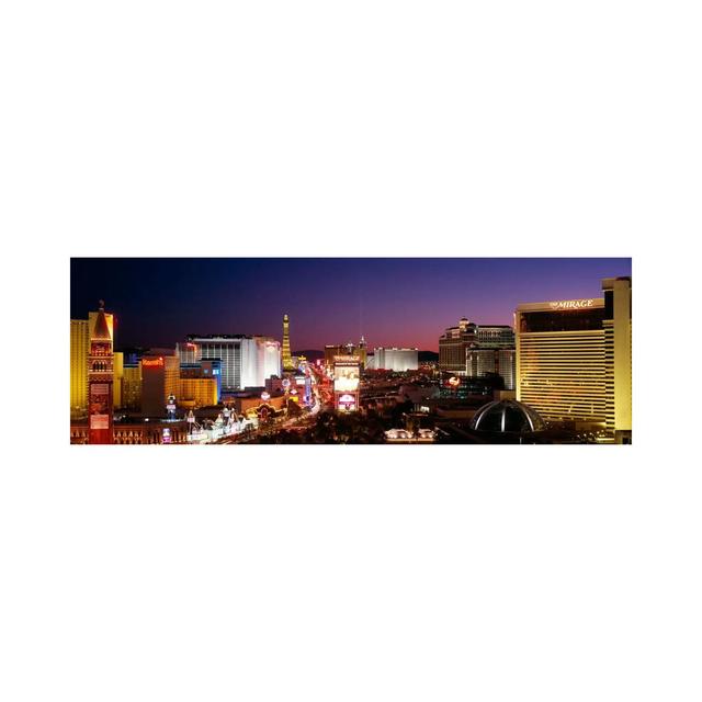 Buildings Lit Up At Night, Las Vegas, Nevada, USA #2 - Wrapped Canvas Panoramic Print Ebern Designs Size: 60.96cm H x 182.88cm W x 3.81cm D on Productcaster.