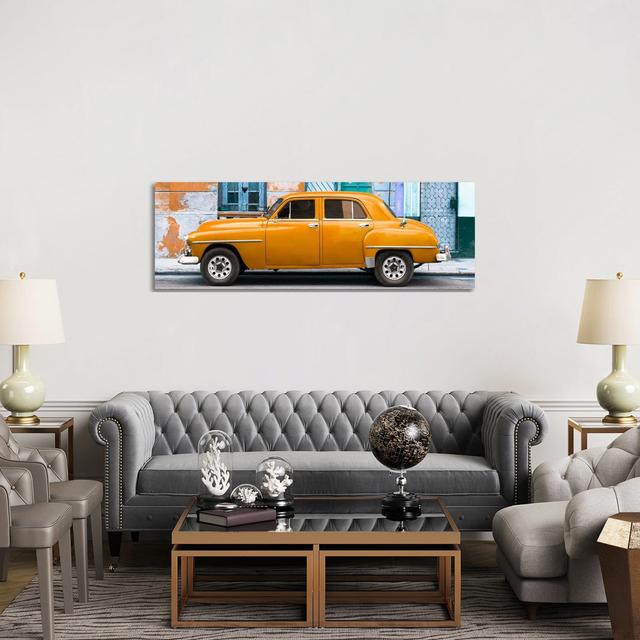 Orange Classic American Car by Philippe Hugonnard - Wrapped Canvas Panoramic Print Ebern Designs Size: 50.8cm H x 152.4cm W x 1.91cm D on Productcaster.