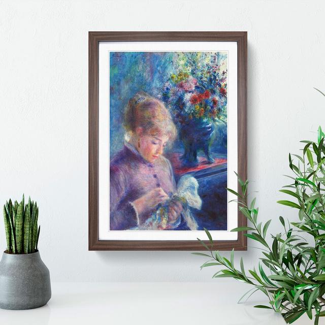 Young Woman Sewing by Pierre-Auguste Renoir - Picture Frame Painting East Urban Home Frame Option: Walnut Framed, Size: 65cm H x 48cm W x 2cm D on Productcaster.