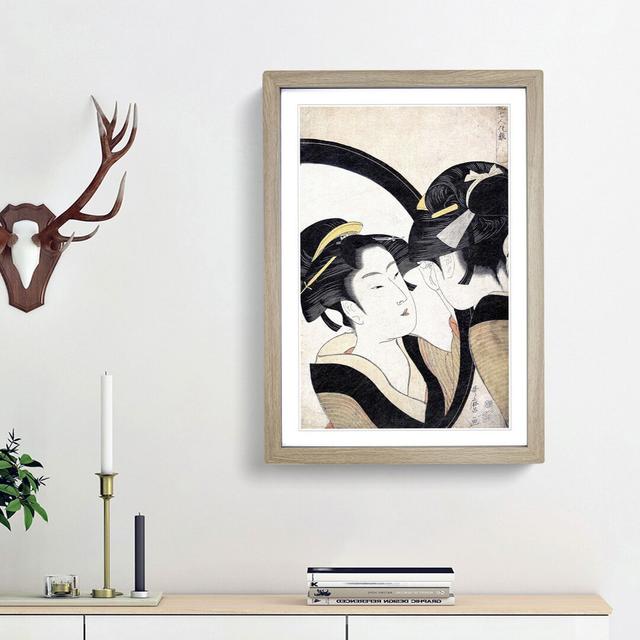 Girl Admiring Herself by Kitagawa Utamaro - Picture Frame Painting Print East Urban Home Size: 65cm H x 48cm W x 2cm D, Frame Option: Oak Framed on Productcaster.