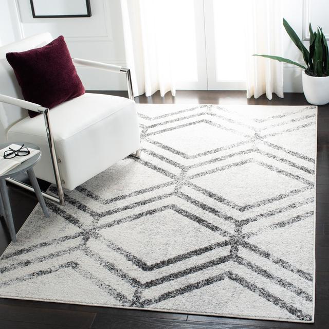 Shenfield Looped/Hooked Ivory Rug Ebern Designs Rug Size: Rectangle 183 x 274cm on Productcaster.