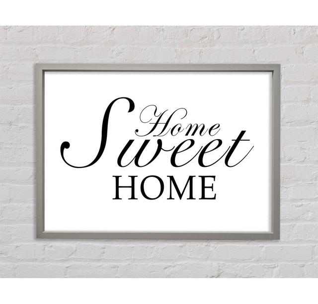 Home Quote Home Sweet Home Grey White Framed Print Happy Larry Size: 59.7cm H x 84.1cm W x 3.3cm D, Colour: White on Productcaster.