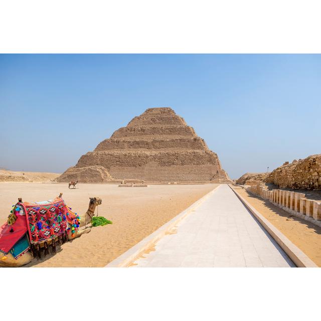 Camels At The Step Pyramid by Caroline Brundle Bugge - No Frame Print on Canvas Natur Pur Size: 30cm H x 46cm W on Productcaster.