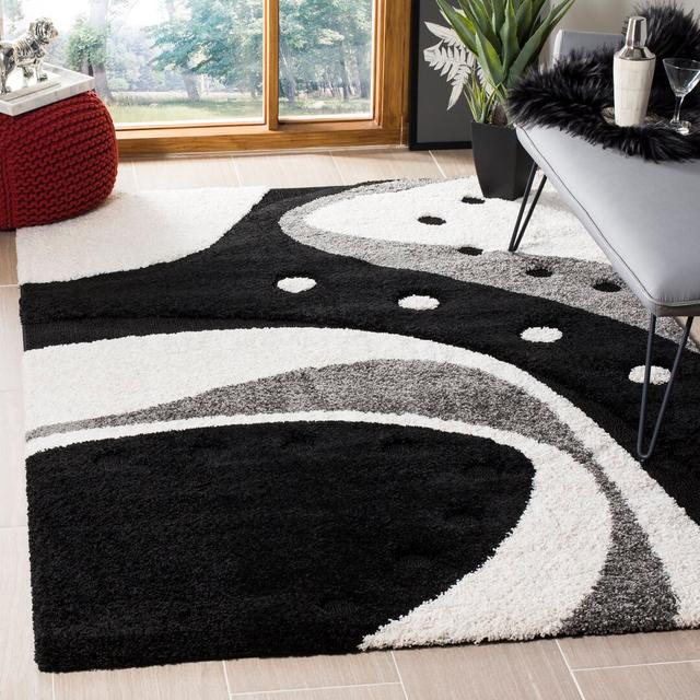 Winchelsea Abstract Machine Woven Black/Ivory Area Rug Metro Lane Rug Size: Rectangle 182 x 274cm on Productcaster.