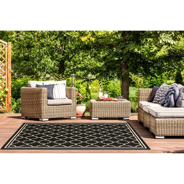 Herefordshire Indoor/Outdoor Hooked Black/Beige Rug Ophelia & Co. Rug Size: Rectangle 77 x 152cm on Productcaster.