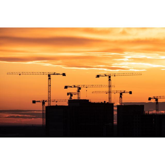 Crane, Building Silhouettes at Sunrise. by Filistimlyanin - Wrapped Canvas Photograph Latitude Run Size: 51cm H x 76cm W on Productcaster.