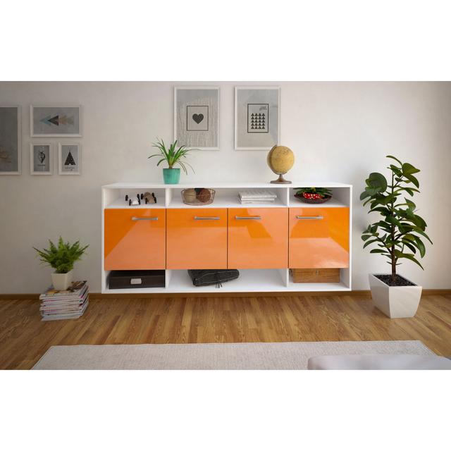 Neelish sideboard, flying/metal handles, size: 180 x 79 x 35cm Ebern Designs Colour: Orange/White on Productcaster.