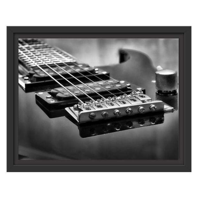 Gerahmtes Wandbild Black E-Guitar East Urban Home Größe: 30 cm H x 38 cm B on Productcaster.