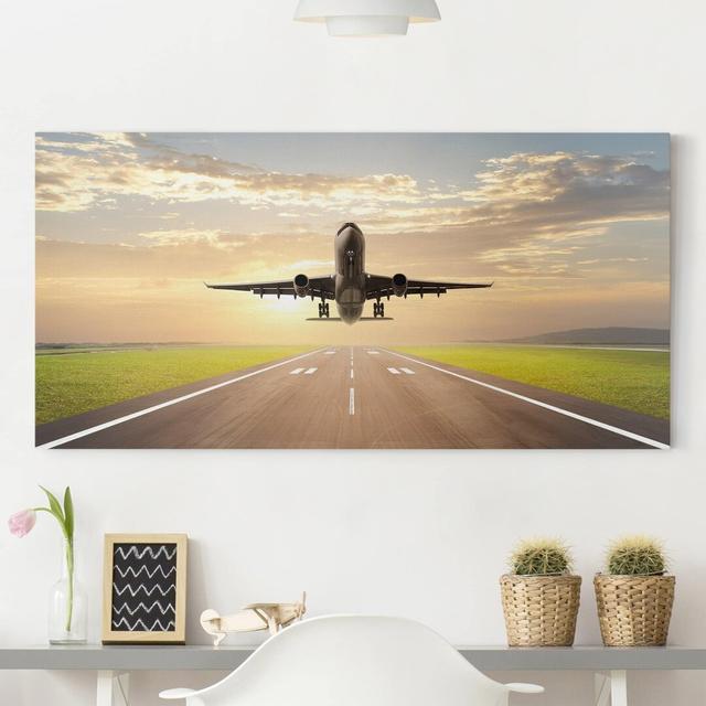 Leinwandbild Startendes Flugzeug Ebern Designs Format: 260g/m² Canvas, Größe: 50cm H x 100cm B on Productcaster.