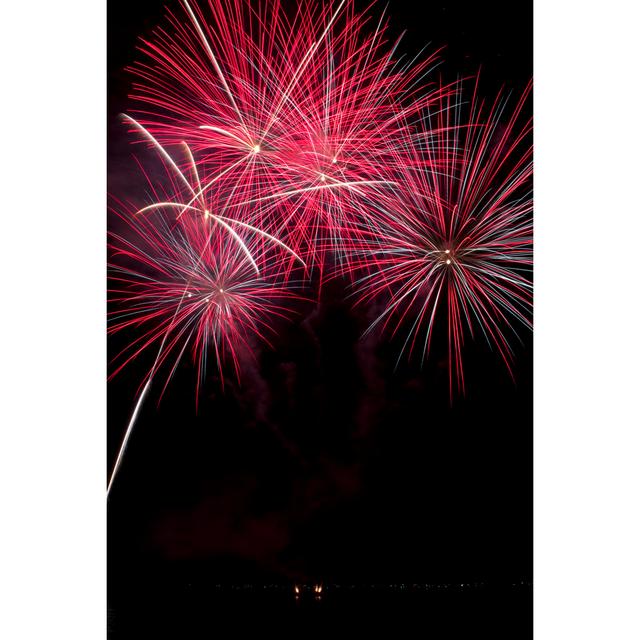 Red And Blue Fireworks by MichaelDrapeau - No Frame Art Prints on Canvas Metro Lane Size: 76cm H x 51cm W on Productcaster.