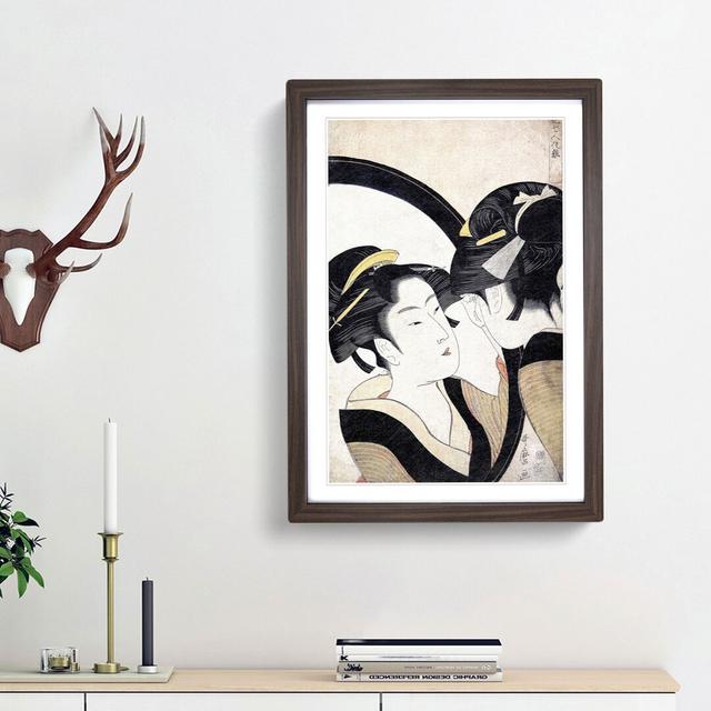 Girl Admiring Herself by Kitagawa Utamaro - Picture Frame Painting Print East Urban Home Size: 65cm H x 48cm W x 2cm D, Frame Option: Walnut Framed on Productcaster.