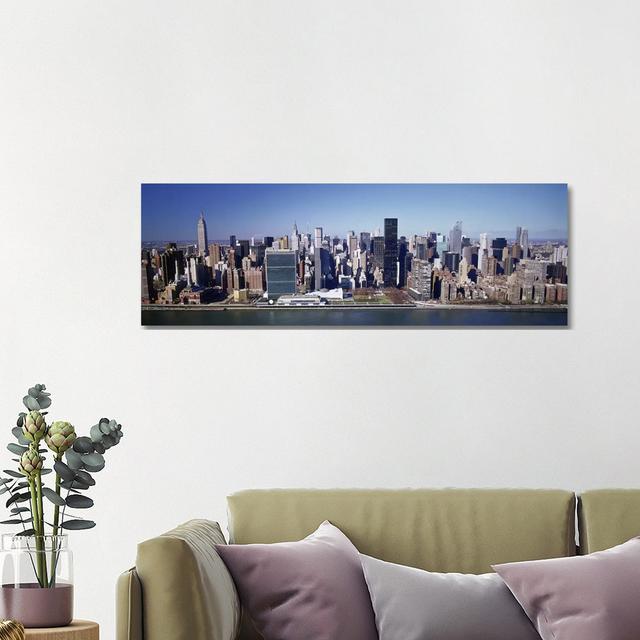 Buildings On The Waterfront, Manhattan, New York City, New York State, USA - Wrapped Canvas Panoramic Print Ebern Designs Size: 40.64cm H x 121.92cm W on Productcaster.