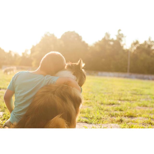 Boy With His Dog Best Friend In Sunset by Milan_Jovic - No Frame Art Prints on Canvas 17 Stories Size: 30cm H x 46cm W on Productcaster.