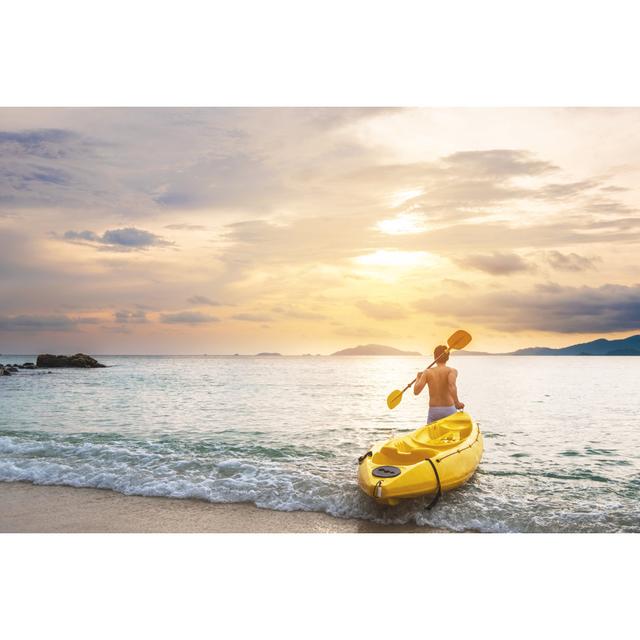 Cosme Asian Guy Pulling Kayak - Wrapped Canvas Photograph House of Hampton Size: 51cm H x 76cm W x 3.8cm D on Productcaster.