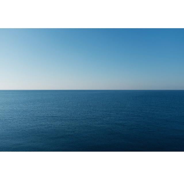 Unframed Photograph Print on Glass Longshore Tides Size: 120cm H x 180cm W x 0.4cm D on Productcaster.