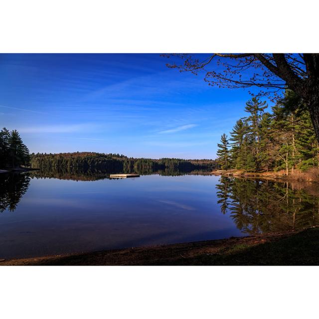 Blue Bay On Mirro Calm Lake - Wrapped Canvas Print Ebern Designs Size: 61cm H x 91cm W x 3.8cm D on Productcaster.