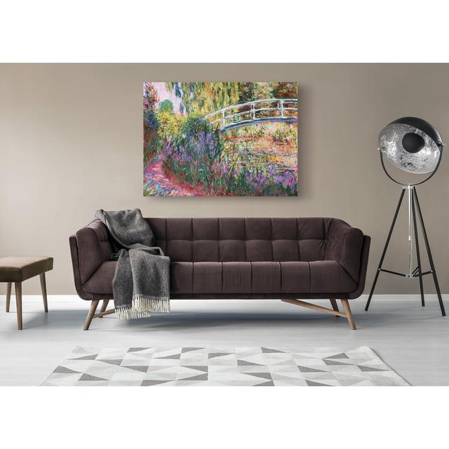 Wandbild Die japanische Brücke, Teich mit Seerosen von Claude Monet Ophelia & Co. Größe: 50 cm H x 70 cm B, Format: Leinwand umschließt Rahmen on Productcaster.