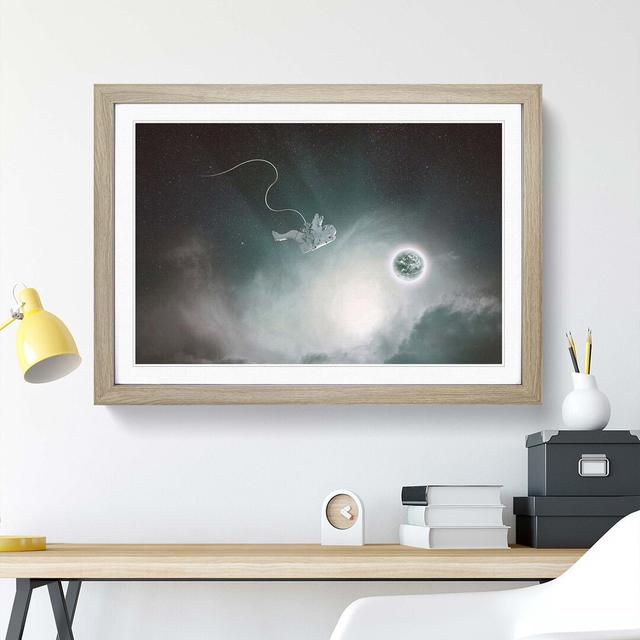 Lone Astronaut in Outer Space in Abstract - Picture Frame Graphic Art Print East Urban Home Frame Option: Oak, Size: 35cm H x 50cm W x 2cm D on Productcaster.