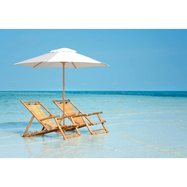 Bamboo Chairs And Umbrella On A Beach In Florida, USA by Cdwheatley - No Frame Art Prints on Canvas Beachcrest Home Size: 60cm H x 90cm W on Productcaster.