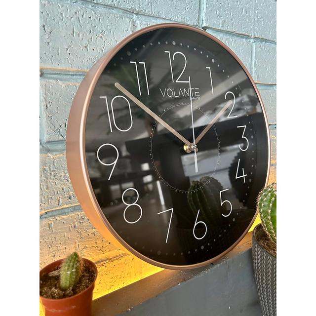 Angelysse Wall Clock Latitude Run Colour: Bronze on Productcaster.