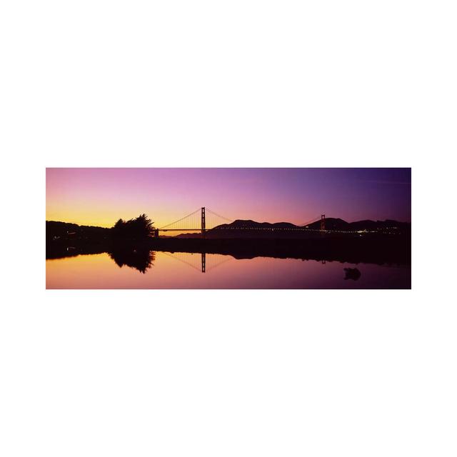 Reflection of a Suspension Bridge on Water, Golden Gate Bridge - Wrapped Canvas Panoramic Photograph Ebern Designs Size: 50.8cm H x 152.4cm W x 1.905c on Productcaster.