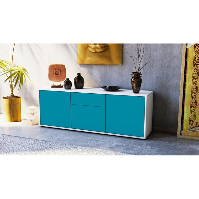 Wymore TV Stand for TVs up to 60" Brayden Studio Colour: Turquoise / Matte White on Productcaster.