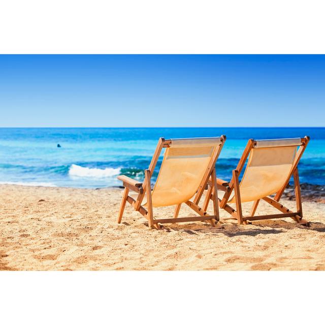 Chairs On Sandy Beach by Mbbirdy - No Frame Print on Canvas House of Hampton Size: 60cm H x 90cm W on Productcaster.