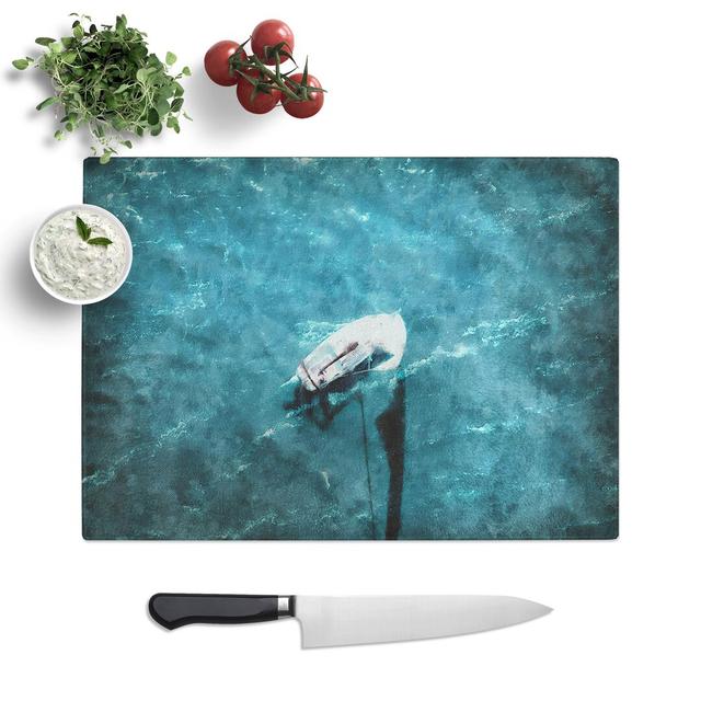 Scow Boat Out Sailing Chopping Board East Urban Home Size: 0.4cm H x 28.5cm W x 39cm L on Productcaster.